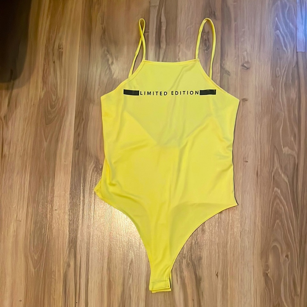 Yellow “limited edition” body suit